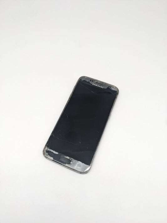 Samsung Galaxy S7 SM-G930T Schwarz Teilespender | LÄDT/STARTET NICHT