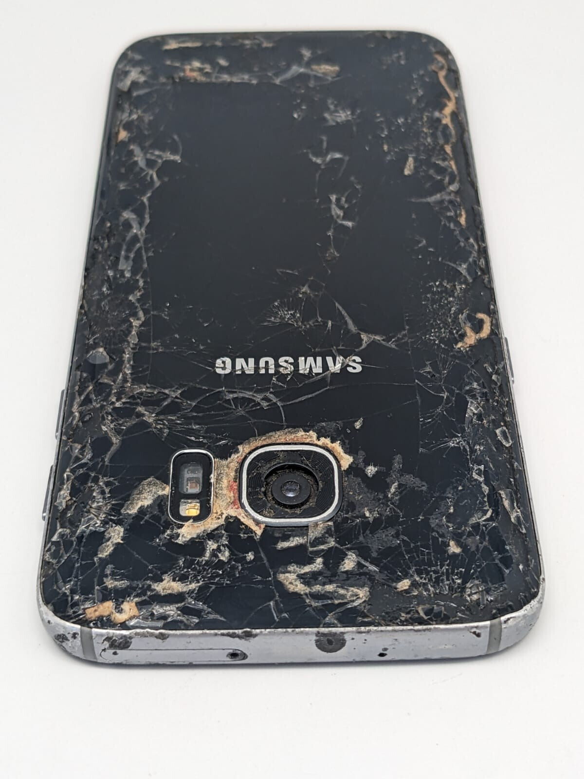 Samsung Galaxy S7 SM-G930T Schwarz Teilespender | LÄDT/STARTET NICHT