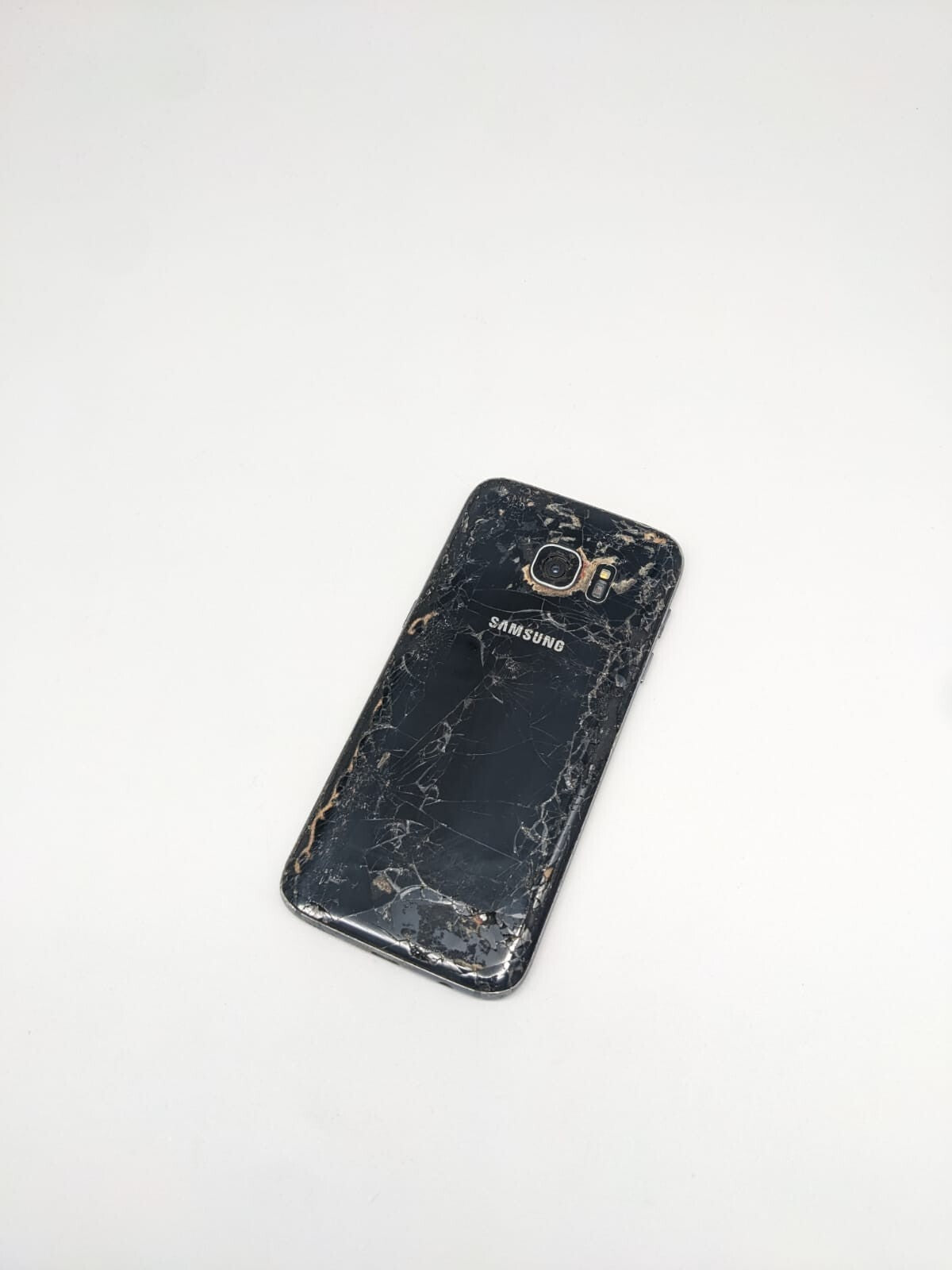 Samsung Galaxy S7 SM-G930T Schwarz Teilespender | LÄDT/STARTET NICHT
