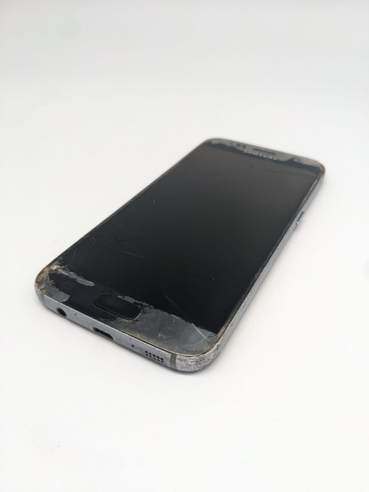 Samsung Galaxy S7 SM-G930T Schwarz Teilespender | LÄDT/STARTET NICHT