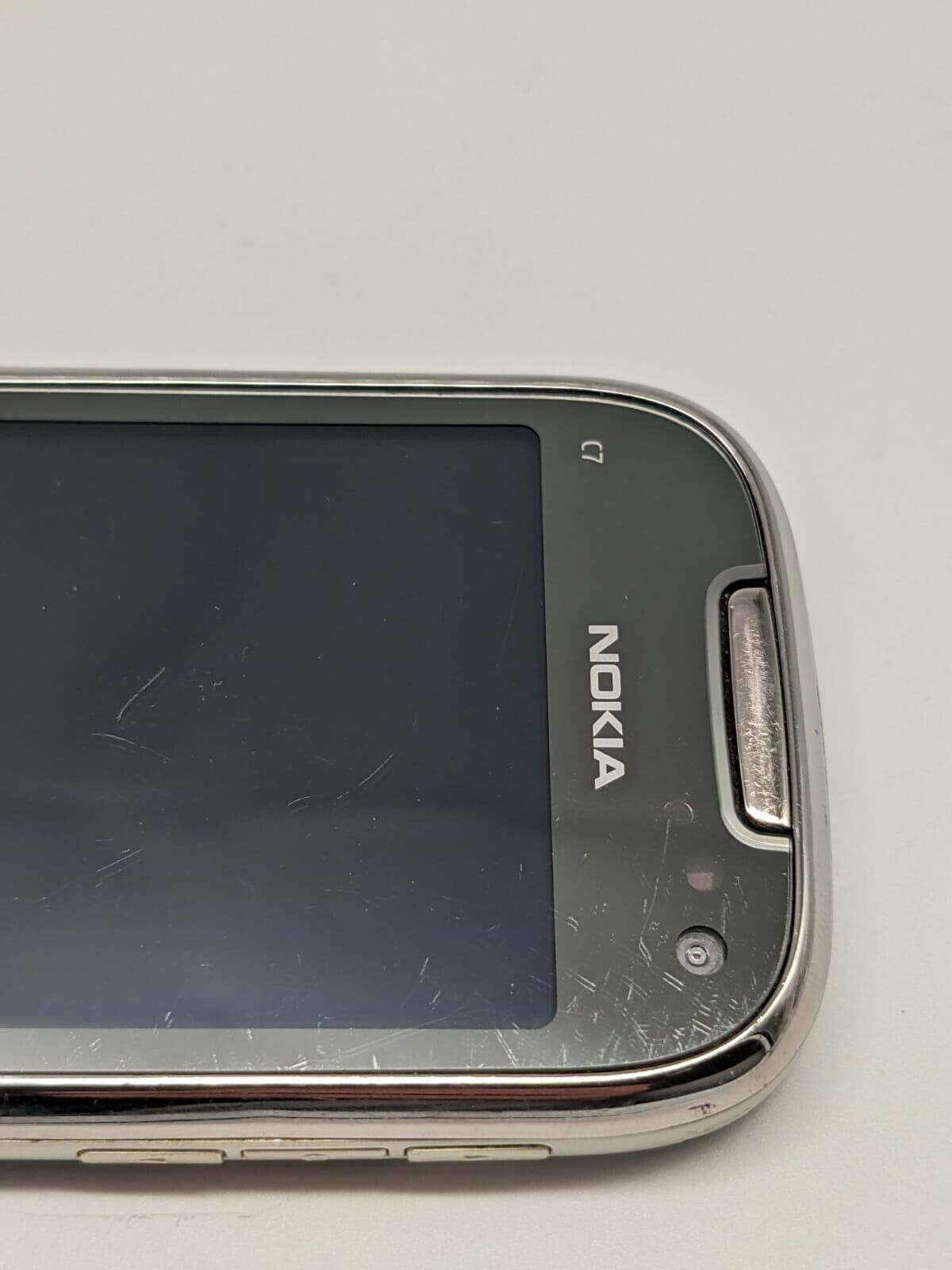 Nokia C7-00 RM-675 8GB Frosty Metal | SIMSLOT DEFEKT.